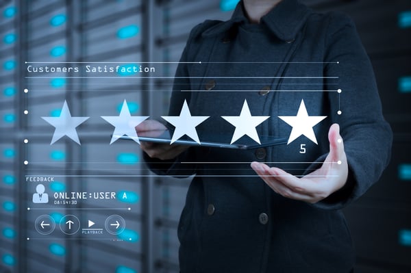 Five stars (5) rating with a businessman is touching virtual computer screen.For positive customer feedback and review with excellent performance.